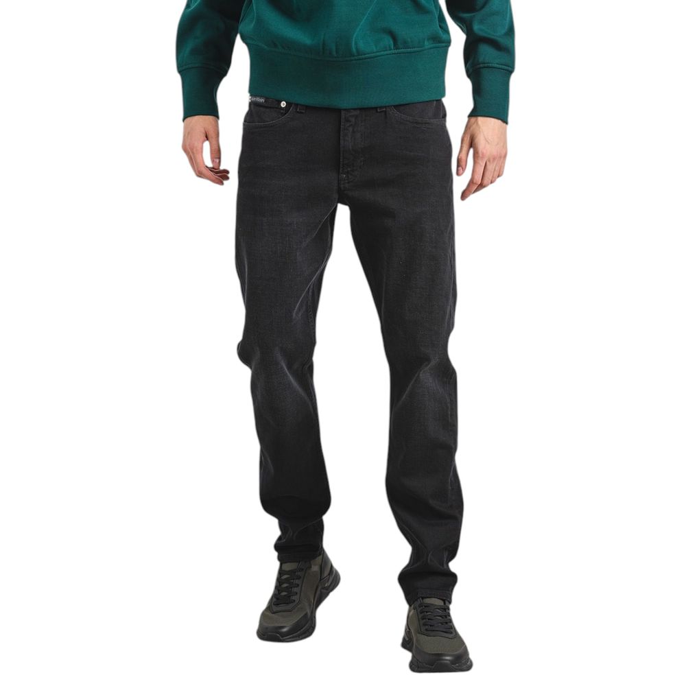 Black Cotton Slim Fit JeanDiscover the Calvin Klein Jeans SLIM TAPER J30J326842 tapered jeans for men, an essential piece for your wardrobe. Made from high-quality materials, these jeans feature 92% cotton, 6% elastomultiester, and 2% elastane/lycra, ensu