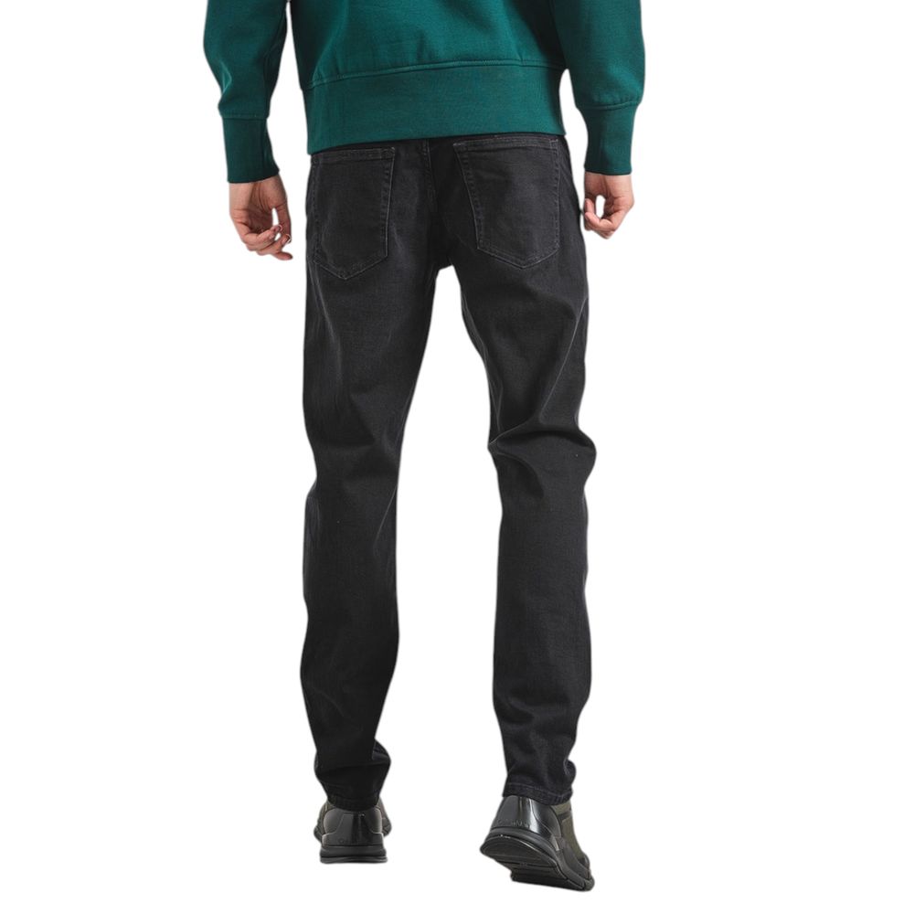 Black Cotton Slim Fit JeanDiscover the Calvin Klein Jeans SLIM TAPER J30J326842 tapered jeans for men, an essential piece for your wardrobe. Made from high-quality materials, these jeans feature 92% cotton, 6% elastomultiester, and 2% elastane/lycra, ensu
