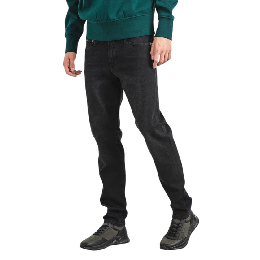 Black Cotton Slim Fit JeanDiscover the Calvin Klein Jeans SLIM TAPER J30J326842 tapered jeans for men, an essential piece for your wardrobe. Made from high-quality materials, these jeans feature 92% cotton, 6% elastomultiester, and 2% elastane/lycra, ensu