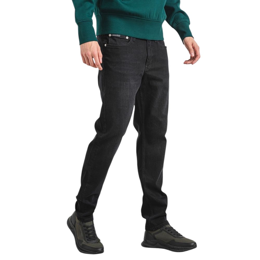 Black Cotton Slim Fit JeanDiscover the Calvin Klein Jeans SLIM TAPER J30J326842 tapered jeans for men, an essential piece for your wardrobe. Made from high-quality materials, these jeans feature 92% cotton, 6% elastomultiester, and 2% elastane/lycra, ensu