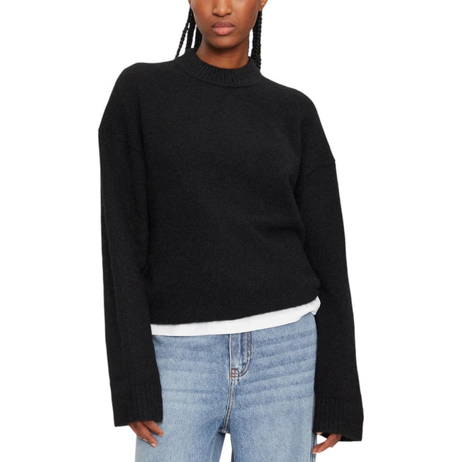 Black Polyester SweaterDiscover the Calvin Klein Jeans TEXTURED LOOSE SWEAT J20J224636 women’s sweater, an essential piece for your winter wardrobe. Made from a blend of 58% polyester, 40% wool, and 2% elastane/lycra, this sweater offers unmatched softnes