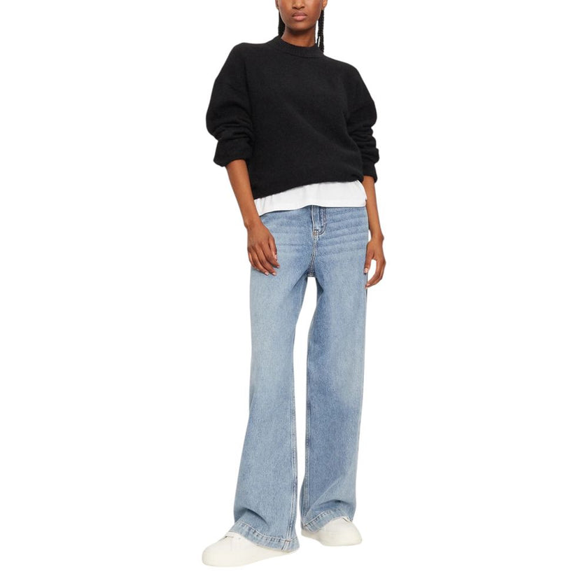 Black Polyester SweaterDiscover the Calvin Klein Jeans TEXTURED LOOSE SWEAT J20J224636 women’s sweater, an essential piece for your winter wardrobe. Made from a blend of 58% polyester, 40% wool, and 2% elastane/lycra, this sweater offers unmatched softnes