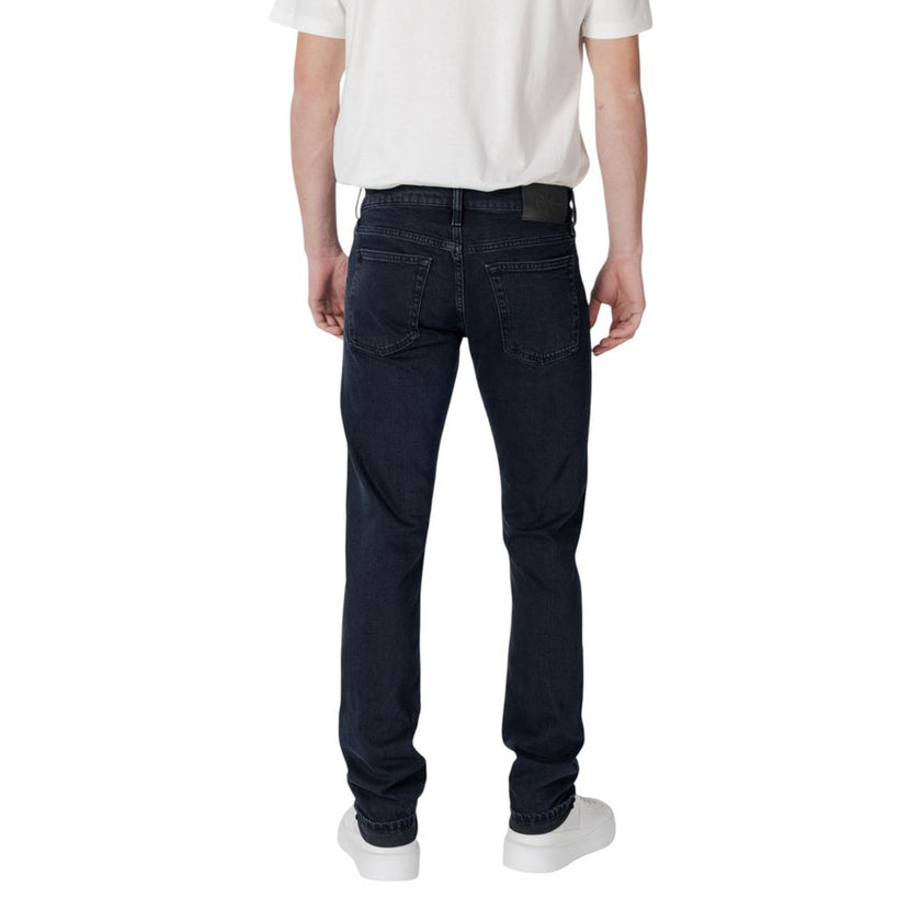 Blue Cotton Skinny JeanDiscover the slim fit jeans for men by Calvin Klein Jeans, model J30J325975, made with high-quality materials: 79% cotton, 20% recycled cotton, and 1% elastane/lycra. These jeans offer a modern and comfortable fit, perfect for any o