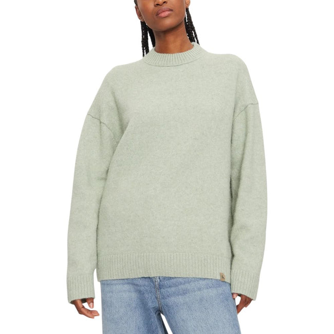 Green Polyester SweaterDiscover the Calvin Klein Jeans TEXTURED LOOSE SWEAT J20J224636 women’s sweater, an essential piece for your winter wardrobe. Made from a blend of 58% polyester, 40% wool, and 2% elastane/lycra, this sweater offers unmatched softnes