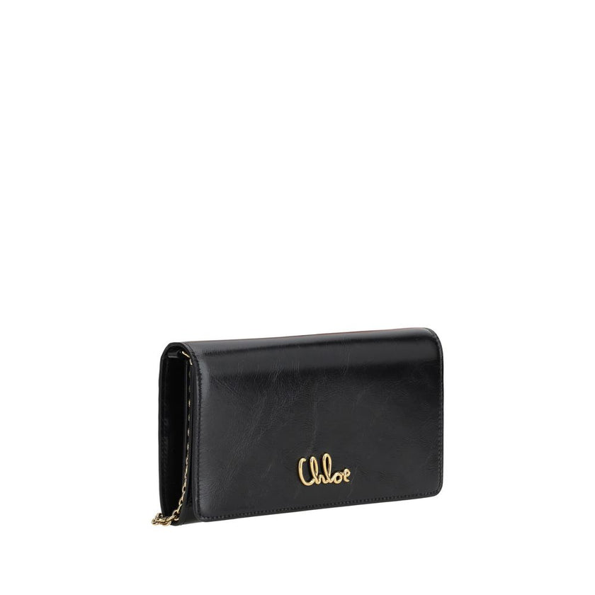 Brown Calf Leather Bos Taurus Clutch BagThe Chloé Iconic Pochette is a sophisticated and elegant accessory, perfect for adding a touch of class to every look. The compact and refined design is enriched by the removable chain shoulder strap, which allows i