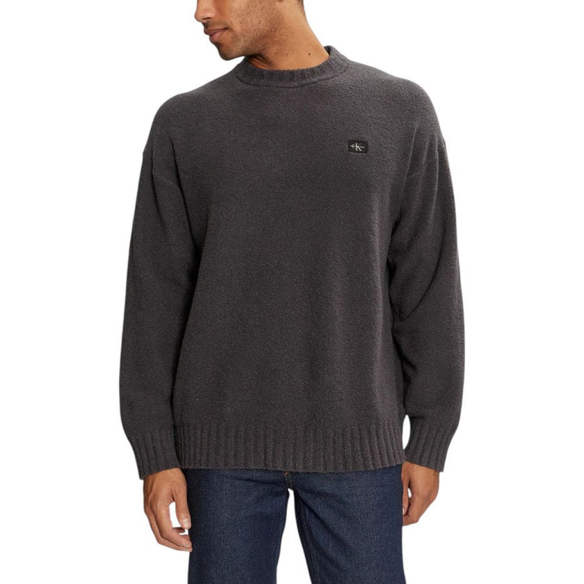 Gray Cotton SweatshirtDiscover the Boucle Boxy Sweater by Calvin Klein Jeans, an essential piece for your men’s wardrobe. Made with a blend of 66% cotton, 32% recycled polyester, and 2% elastane/lycra, this sweater provides comfort and softness against th