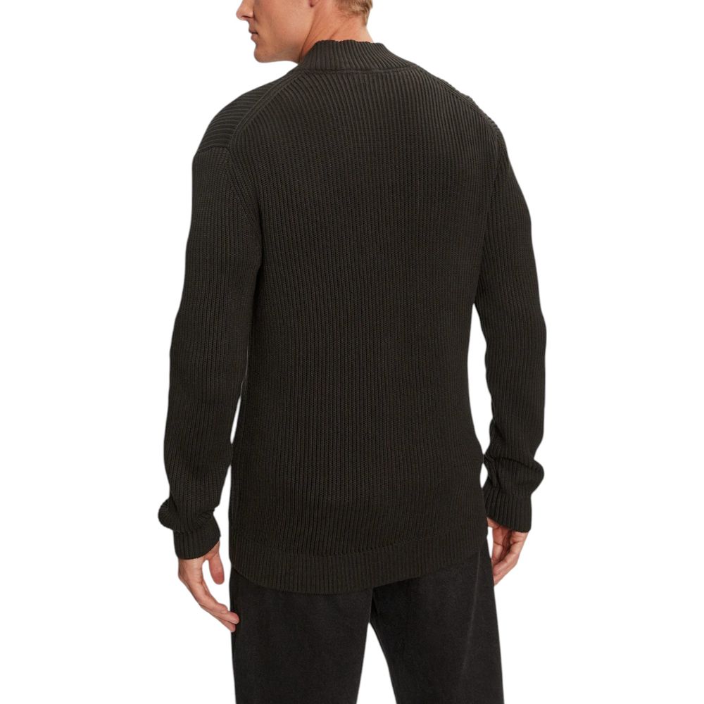 Black Cotton CardiganDiscover the Calvin Klein Jeans WOVEN LABEL ZIP THRO cardigan for men, an essential piece for your wardrobe. Made from 100% cotton, this cardigan offers exceptional comfort and a perfect fit. The ribbed design adds a touch of casual e