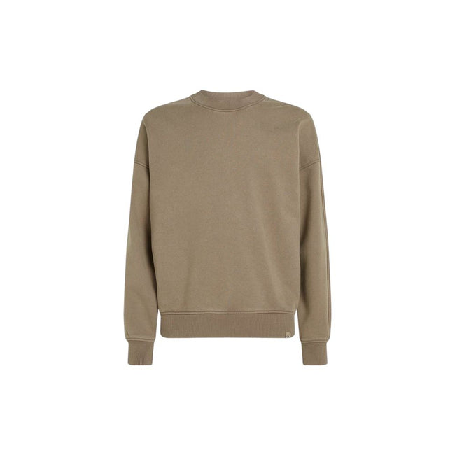 Beige Cotton SweatshirtDiscover the Calvin Klein Jeans WASHED HEAVY CREW NE J30J326687 sweatshirt for men, a clothing piece that combines style and comfort. Made from 80% cotton and 20% recycled cotton, this sweatshirt feels soft to the touch and is envir