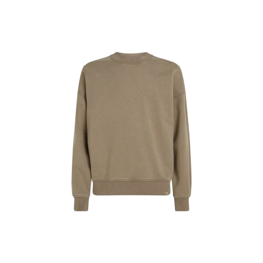 Beige Cotton SweatshirtDiscover the Calvin Klein Jeans WASHED HEAVY CREW NE J30J326687 sweatshirt for men, a clothing piece that combines style and comfort. Made from 80% cotton and 20% recycled cotton, this sweatshirt feels soft to the touch and is envir