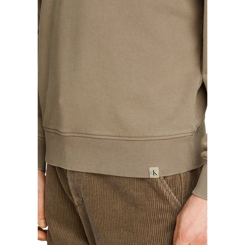 Beige Cotton SweatshirtDiscover the Calvin Klein Jeans WASHED HEAVY CREW NE J30J326687 sweatshirt for men, a clothing piece that combines style and comfort. Made from 80% cotton and 20% recycled cotton, this sweatshirt feels soft to the touch and is envir