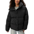 Black Polyester ClothingThe Relaxed Puffer jacket by Calvin Klein Jeans is perfect for women seeking comfort and style in one piece. Made from 100% polyester, this puffer provides excellent protection against the cold, thanks to its generous padding and e