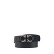 Black Calf Leather Bos Taurus Regular BeltFerragamo’s leather Belt features a buckle with the brand’s iconic Gancini logo, a distinctive symbol. At 2.5 cm thick, this belt offers an elegant and versatile design, perfect for completing sophisticated, every