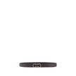 Black Calf Leather Bos Taurus Regular BeltFerragamo’s leather Belt features a buckle with the brand’s iconic Gancini logo, a distinctive symbol. At 2.5 cm thick, this belt offers an elegant and versatile design, perfect for completing sophisticated, every
