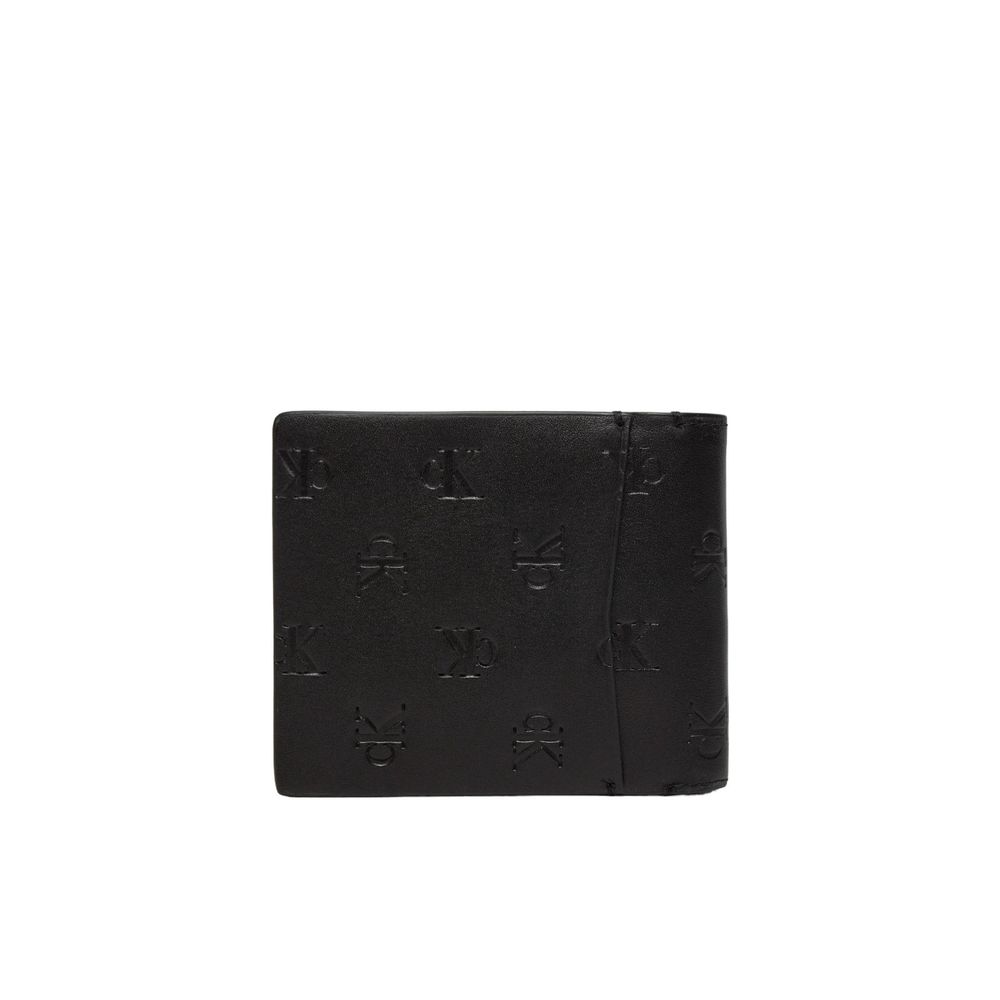Black Leather WalletThe Calvin Klein Jeans AOP EMBOSS BIFOLD K50K512588 men’s wallet is a stylish and modern accessory, crafted entirely from high-quality leather. The bifold design without coin pocket ensures practicality and a slim profile, perfect for