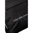 Black Recycled Polyester Messenger BagThe Calvin Klein SPORT ESSENTIALS REPORTER18 M K50K512011 men’s crossbody bag is the perfect accessory for those seeking practicality and style. Made from 100% recycled polyester, this bag is not only sustainable but