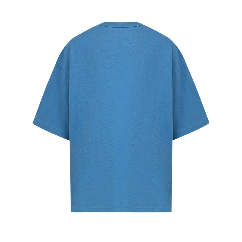 Blue Cotton T-ShirtBottega Veneta oversized cotton jersey T-shirt Materials: cotton jersey Size and fit: oversize Neckline: Crew neck Shoulders: relaxed Sleeves: short Pockets: studded patch pocket Bottom: With ribbed edges, With straight hemline Made In