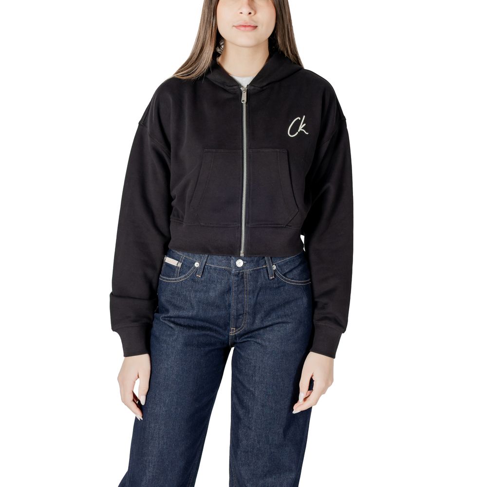Black Cotton HoodyDiscover the women’s hoodie from Calvin Klein Jeans EMBROIDERED CK ZIP T J20J224440, an essential piece for your wardrobe. Made from 100% cotton, this hoodie offers a soft and comfortable feel, perfect for any casual occasion. The front