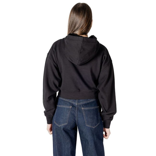 Black Cotton HoodyDiscover the women’s hoodie from Calvin Klein Jeans EMBROIDERED CK ZIP T J20J224440, an essential piece for your wardrobe. Made from 100% cotton, this hoodie offers a soft and comfortable feel, perfect for any casual occasion. The front