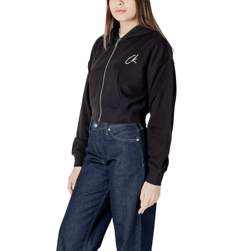 Black Cotton HoodyDiscover the women’s hoodie from Calvin Klein Jeans EMBROIDERED CK ZIP T J20J224440, an essential piece for your wardrobe. Made from 100% cotton, this hoodie offers a soft and comfortable feel, perfect for any casual occasion. The front