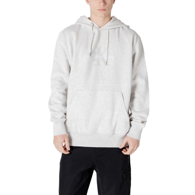 Gray Cotton HoodieThe Calvin Klein Jeans CHENILLE MONOLOGO hoodie for men is an essential piece for your wardrobe. Made from 100% cotton, it offers a soft and comfortable feel, perfect for everyday wear. The minimalist design is enhanced by a chenille log