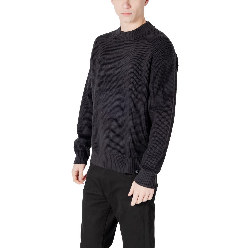 Black Organic Cotton SweaterDiscover the Calvin Klein Jeans CHUNKY TEXTURE SWEAT menâs sweater, a high-quality piece made from 80% organic cotton, 17% polyamide, and 3% elastane/lycra. This sweater features a chunky texture that adds a modern touch to y