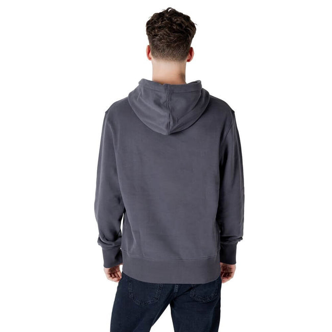 Gray Cotton HoodyDiscover the Calvin Klein Jeans NYC STAMP GRAPHIC HO men’s hoodie, an essential piece for your casual wardrobe. Made from 100% cotton, this hoodie offers exceptional comfort and a soft fit against the skin. The design features a printed l