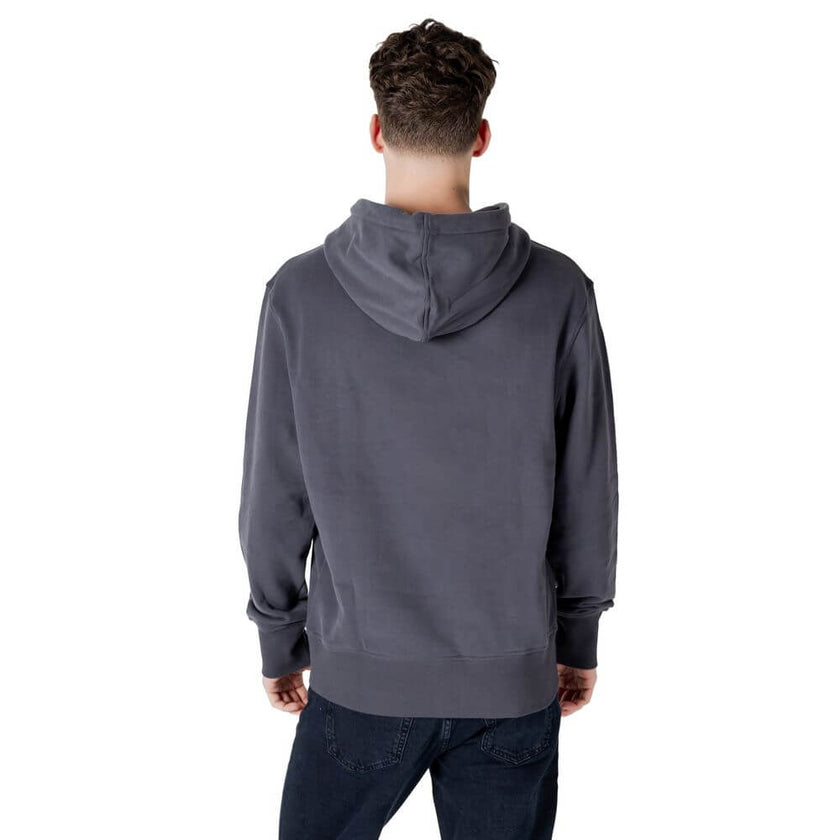 Gray Cotton HoodyDiscover the Calvin Klein Jeans NYC STAMP GRAPHIC HO men’s hoodie, an essential piece for your casual wardrobe. Made from 100% cotton, this hoodie offers exceptional comfort and a soft fit against the skin. The design features a printed l
