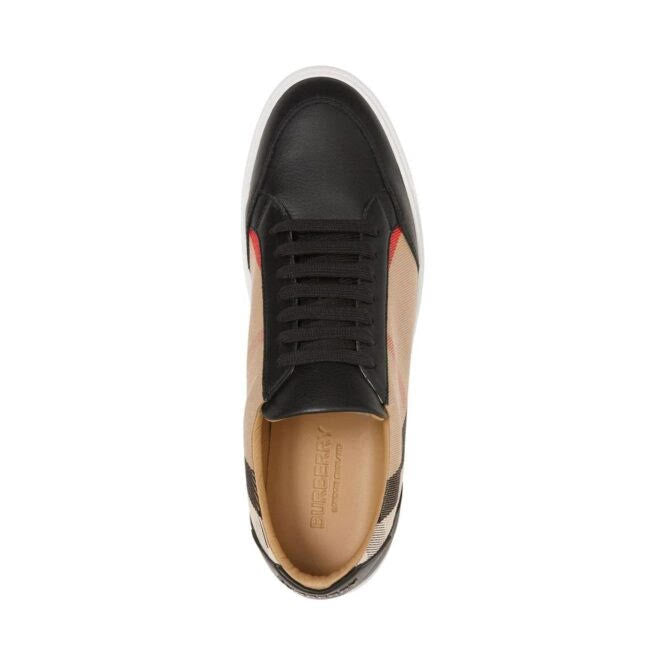 Black Leather New Salmond SneakersSneakers realised in smooth leather and canvas. Low-top lace-up sneakers featuring Burberry’s signature Vintage Check pattern in black, red, and beige. Crafted from a combination of smooth calf leather and cotton canvas,