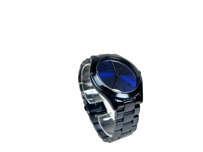Slim Runway Stainless Steel Watch MK3419 Blue NO BOXStyle: Michael Kors (MK3419) Slim Runway Watch Material: Stainless Steel Features: Non-Numeric Stick Hour Markers, Water Resistant 50m, Minimalistic Design Measures: 42 mm Case SizeSlim Runway Stainless