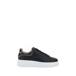Black Rubber Low Top SneakersPhilipp Plein’s leather Sneakers combine elegance and boldness with their distinctive design. The front lace-up closure ensures a secure fit, while the round toe offers comfort and practicality. The iconic contrasting monogram