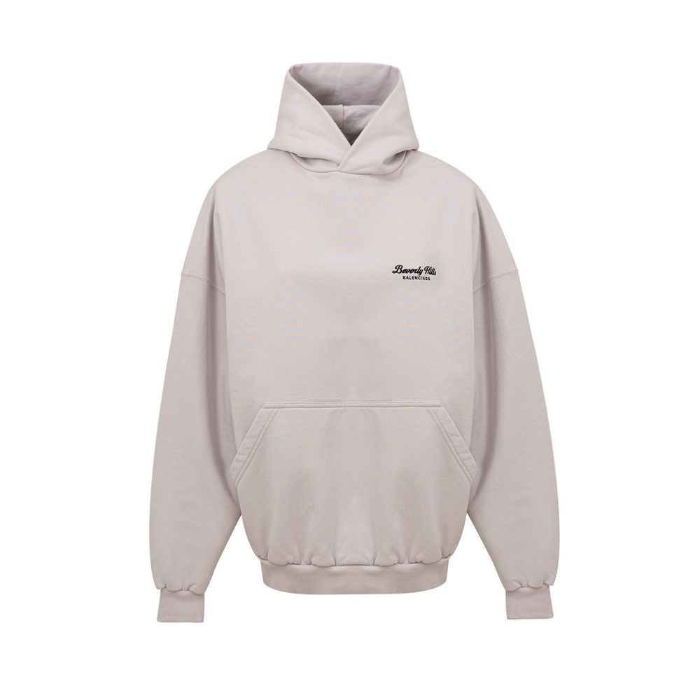 Gray Cotton SweatshirtUnisex Oversized Hoodie ‘Beverly Hills’ Balenciaga. In off white cotton, front pocket with side inserts, contrasting logo embroidery on the side, oversized fit. Composition: 100% Cotton Internal SKU: 25MAR85 Brand SKU: 739024TQVS7Gra
