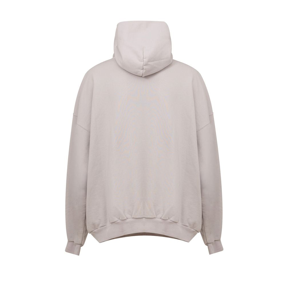 Gray Cotton SweatshirtUnisex Oversized Hoodie ‘Beverly Hills’ Balenciaga. In off white cotton, front pocket with side inserts, contrasting logo embroidery on the side, oversized fit. Composition: 100% Cotton Internal SKU: 25MAR85 Brand SKU: 739024TQVS7Gra
