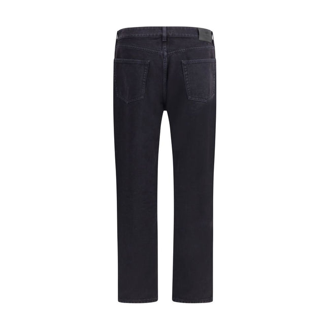 Black Cotton Straight-Leg JeansSaint Laurent’s cotton Long Mick Jeans are a stylish essential made from soft cotton. They feature a straight style that offers a straight and comfortable fit, ideal for a casual yet refined look. The front button closure ad