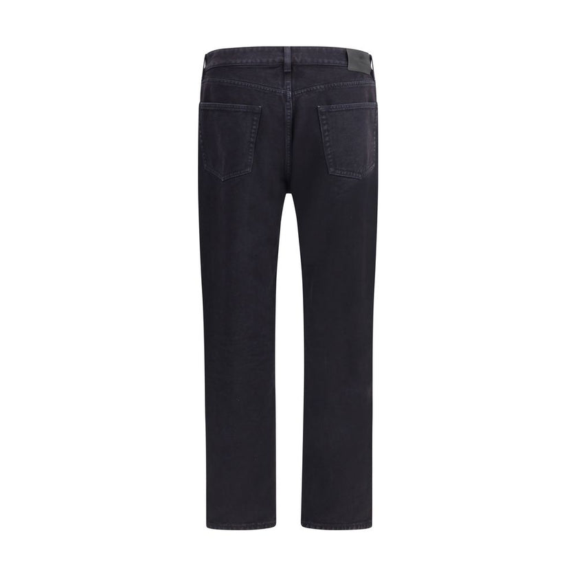 Black Cotton Straight-Leg JeansSaint Laurent’s cotton Long Mick Jeans are a stylish essential made from soft cotton. They feature a straight style that offers a straight and comfortable fit, ideal for a casual yet refined look. The front button closure ad