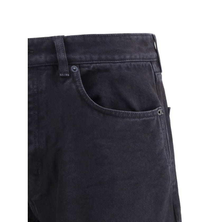 Black Cotton Straight-Leg JeansSaint Laurent’s cotton Long Mick Jeans are a stylish essential made from soft cotton. They feature a straight style that offers a straight and comfortable fit, ideal for a casual yet refined look. The front button closure ad