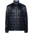 Blue Polyamide Men JacketElevate your outerwear with the Moncler Grenoble jacket, a fusion of luxe and practicality. This high-necked piece, crafted for the fashion-forward, flaunts a padded silhouette with a front zipper closure that adds an edge to any