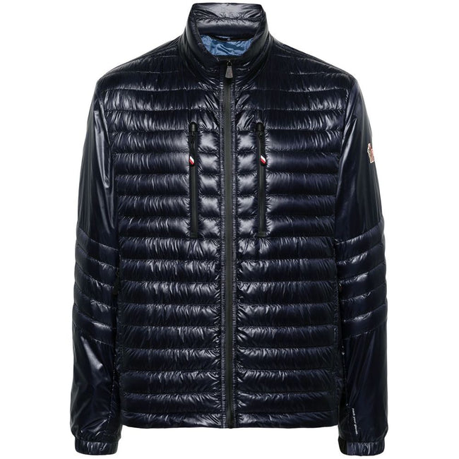 Blue Polyamide Men JacketElevate your outerwear with the Moncler Grenoble jacket, a fusion of luxe and practicality. This high-necked piece, crafted for the fashion-forward, flaunts a padded silhouette with a front zipper closure that adds an edge to any