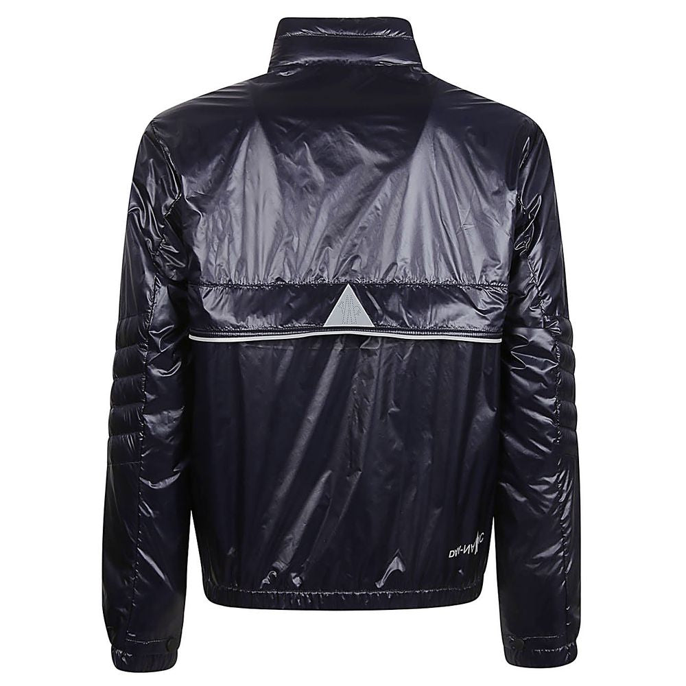 Blue Polyamide Men JacketElevate your outerwear with the Moncler Grenoble jacket, a fusion of luxe and practicality. This high-necked piece, crafted for the fashion-forward, flaunts a padded silhouette with a front zipper closure that adds an edge to any