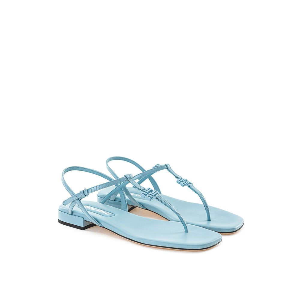 Blue Patent Leather Flip-Flop SandalsMiu Miu Azure Patent Leather Thong Sandal. Square toe, fully open front, T-Style and logo lettering on front. Thin leather outer sole and contrasting under heel in black. Composition: 100% Leather-Sku inside:24GIU41Blu