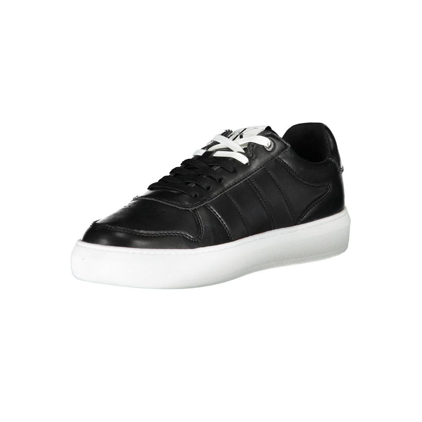 Black Polyester Men SneakerElevate your streetwear game with Calvin Klein’s latest sneakers, epitomizing the pinnacle of urban sophistication. Crafted for the modern man, these kicks feature a sleek black palette punctuated by bold contrasting details and