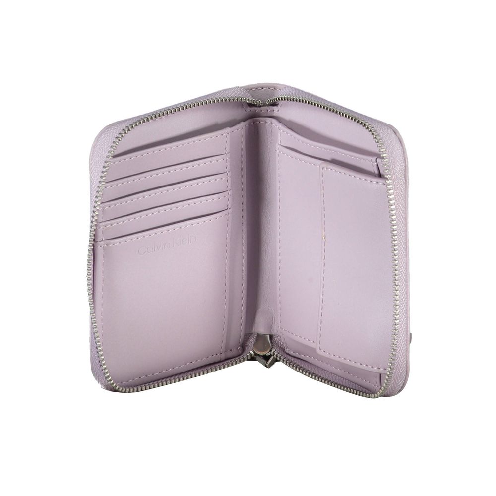 Purple Polyester Women WalletStep into the realm of sophistication with this chic Calvin Klein wallet, where functionality meets elegance. Designed for the modern trendsetter, the wallet features dual compartments, a secure coin purse, and ample space for