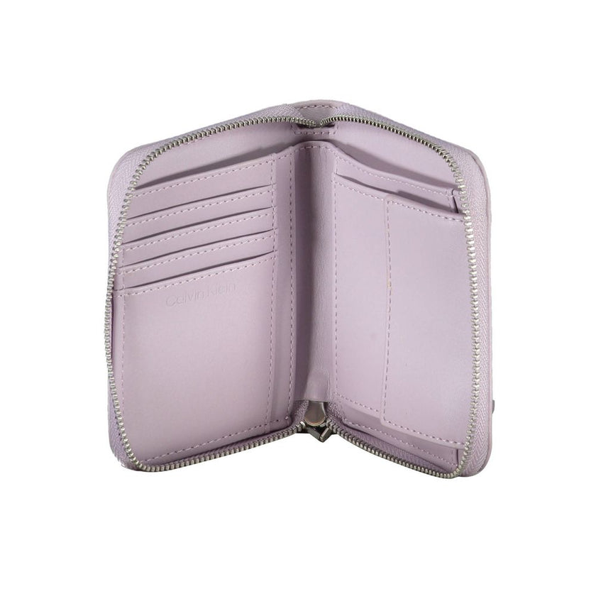 Purple Polyester Women WalletStep into the realm of sophistication with this chic Calvin Klein wallet, where functionality meets elegance. Designed for the modern trendsetter, the wallet features dual compartments, a secure coin purse, and ample space for