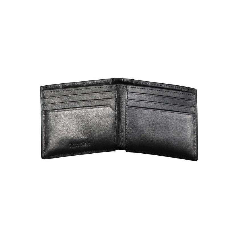 Black Eco Leather Men WalletDive into the epitome of sophistication with this Calvin Klein wallet, an accessory designed for the modern man who appreciates style with functionality. Its sleek black hue boasts a minimalist aesthetic while the RFID blocking
