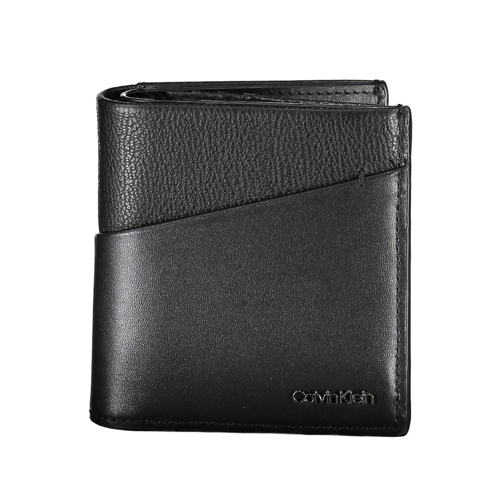 Black Recycled Polyester Men WalletElevate your essentials with the sleek sophistication of the Calvin Klein wallet. Crafted for the modern man, this elegant accessory features two compartments to organize your currency, a secure coin purse, and ample spa