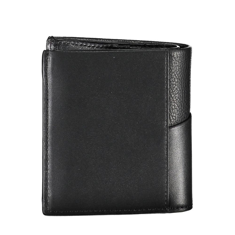 Black Recycled Polyester Men WalletElevate your essentials with the sleek sophistication of the Calvin Klein wallet. Crafted for the modern man, this elegant accessory features two compartments to organize your currency, a secure coin purse, and ample spa
