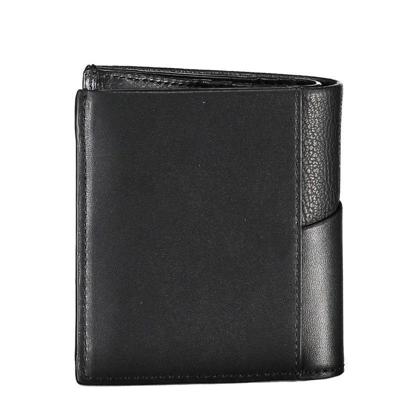 Black Recycled Polyester Men WalletElevate your essentials with the sleek sophistication of the Calvin Klein wallet. Crafted for the modern man, this elegant accessory features two compartments to organize your currency, a secure coin purse, and ample spa