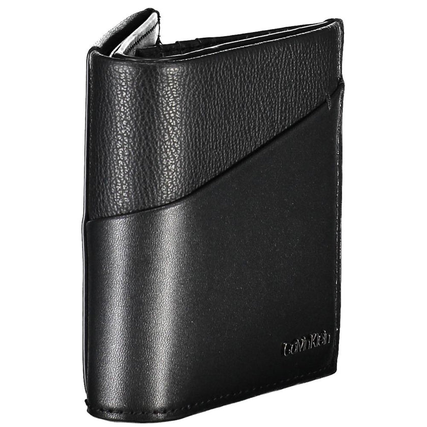 Black Recycled Polyester Men WalletElevate your essentials with the sleek sophistication of the Calvin Klein wallet. Crafted for the modern man, this elegant accessory features two compartments to organize your currency, a secure coin purse, and ample spa
