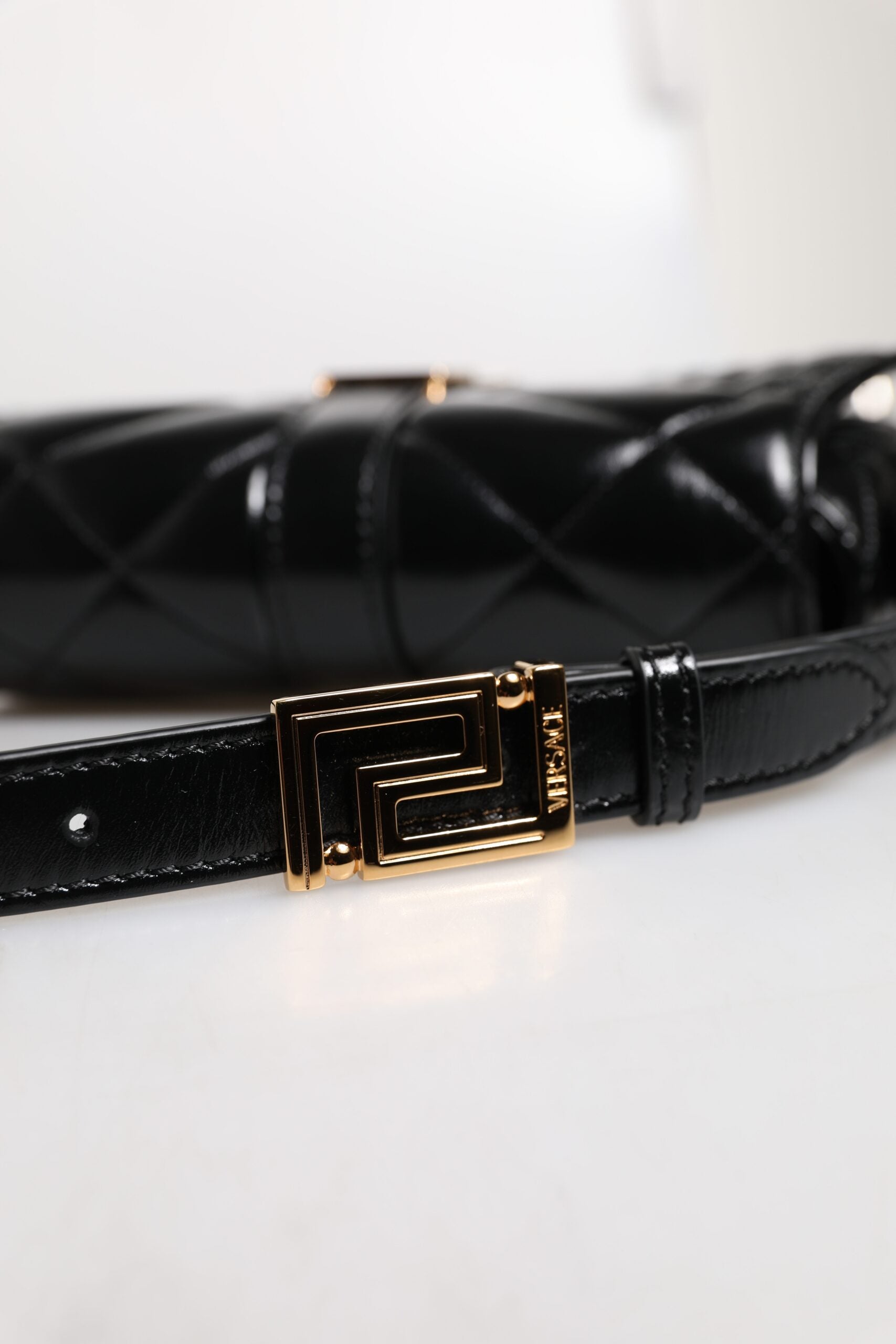 Black Calf Leather Quilted Shoulder Strap BagVERSACE Absolutely stunning, 100% Authentic, brand new VERSACE solid color, shoulder strap. Model: Shoulder bag Material: Calfskin Colour: Black Black inner lining with inside pocket Handle: Adjustable shoulder