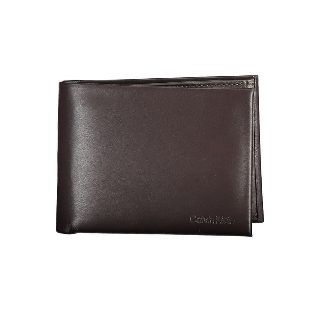 Brown Leather Men WalletIndulge in the essence of sophistication with this Calvin Klein wallet, crafted for the modern man who appreciates the finesse of luxury. With two spacious compartments and a dedicated coin purse, it meets practicality with style.