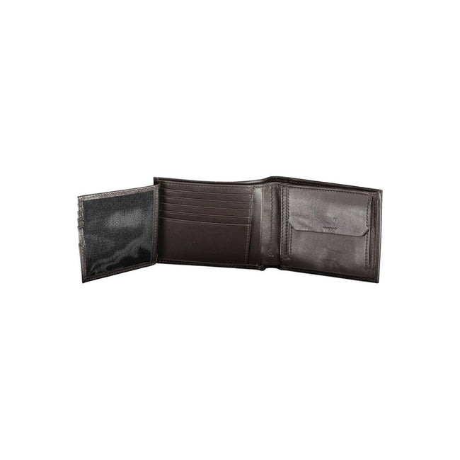 Brown Leather Men WalletIndulge in the essence of sophistication with this Calvin Klein wallet, crafted for the modern man who appreciates the finesse of luxury. With two spacious compartments and a dedicated coin purse, it meets practicality with style.